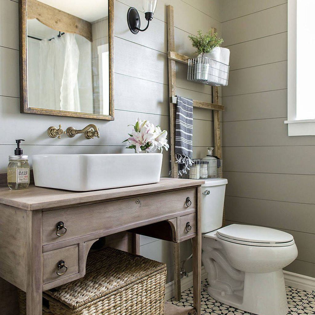 Wooden-vanity-mirror-frame-and-patterned-tiles-usher-in-farmhouse-style-81682