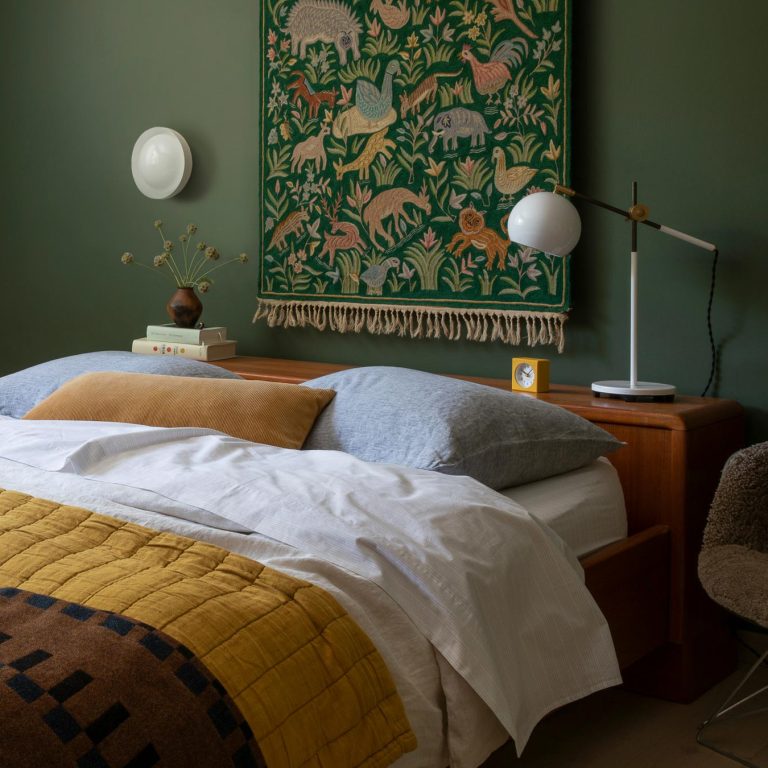 white-wall-sconce-in-bedroom