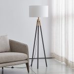 hyde-brass-and-bronze-metal-tripod-floor-lamp-27e9a568f1cd41e0ab551099fab187ce