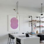 Casual-use-of-Edison-bulbs-above-the-kitchen-counter-lights-up-this-space
