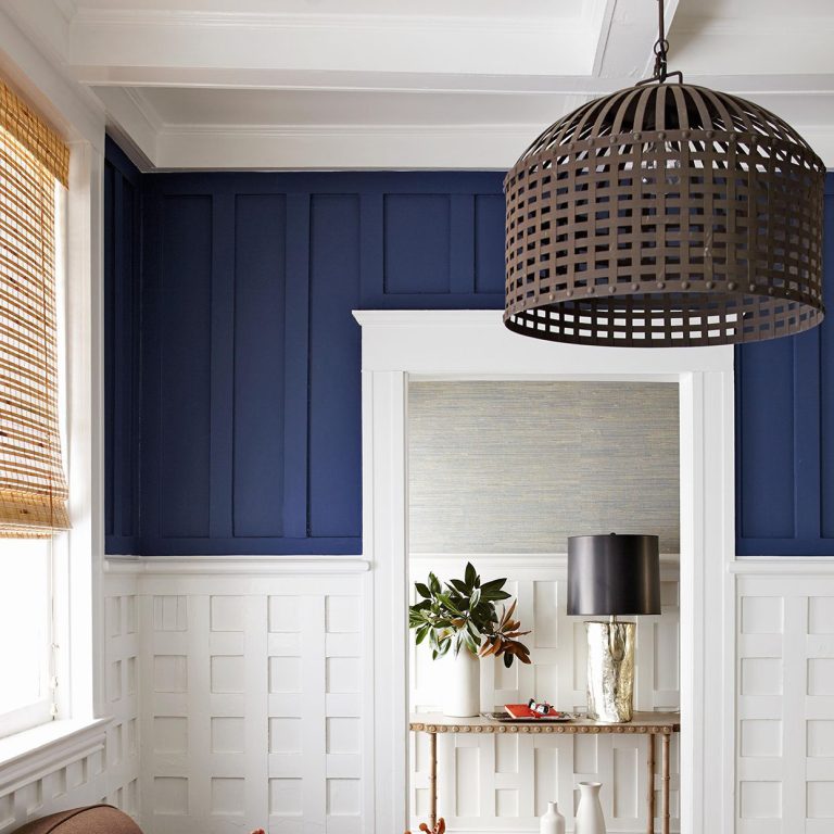 family-room-tan-storage-bins-blue-white-walls-5ac6bad2-a4a728ac400049379df4b0e8203472e9
